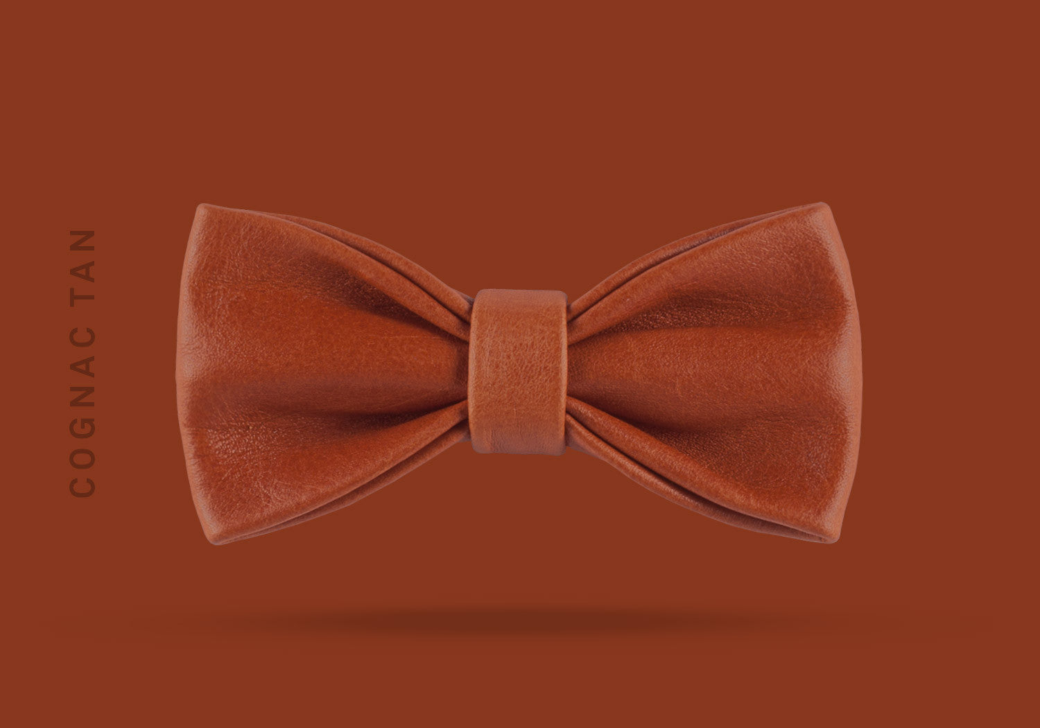 This cognac tan WEEF handmade leather bow is a great present or gift idea for dapper and stylish gentlemen for fathers day, valentines day or Christmas.