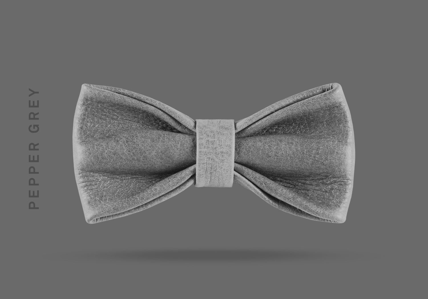 This pepper grey WEEF handmade leather bow is a great present or gift idea for dapper and stylish gentlemen for fathers day, valentines day or Christmas.