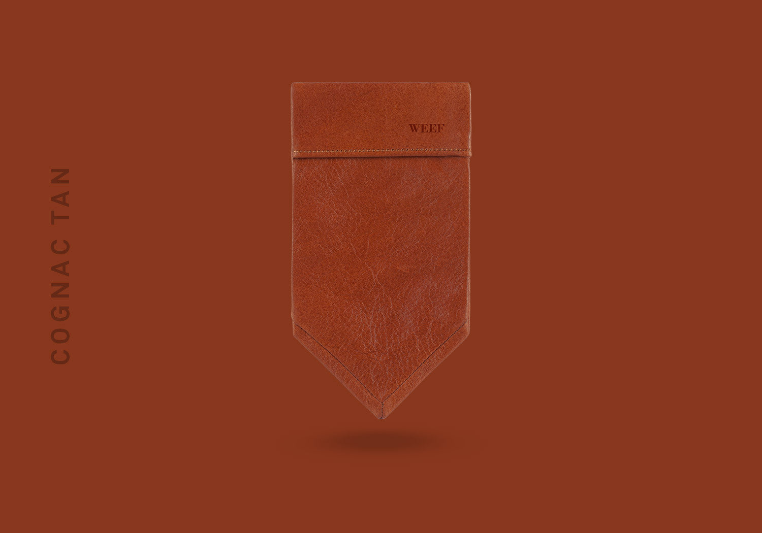 This cognac tan WEEF handmade leather pocket square is a great present or gift idea for dapper and stylish gentlemen for fathers day, valentines day or Christmas.